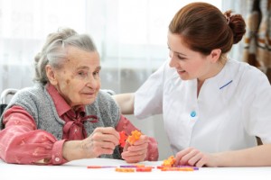 Senior woman with her caregiver