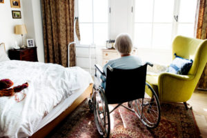 Elder abuse concept: Elderly woman in wheelchair